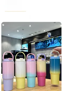 Detailed view of five 30oz gradient stainless steel tumblers with large ring handles