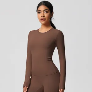 Detail of mocha brown yoga set featuring high-elasticity matte fabric and tight fit