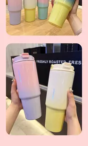 Detail of multi-color gradient 30oz stainless steel tumblers with ergonomic handles