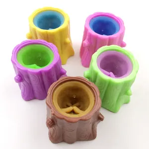 5-piece squirrel stump squeeze toy set in assorted colors with detailed wood grain texture