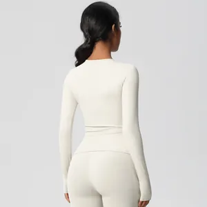 Rear view of slim fit brushed yoga set featuring long sleeve top and high waist leggings