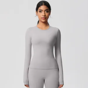 Detail view of high-elastic light grey yoga set with seamless seams and slim fit design