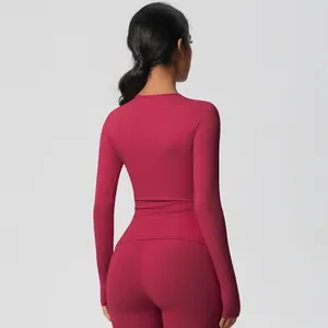 Detail of slim fit rose red yoga set showing high elasticity fabric and back stitching line