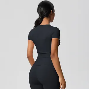 Back view of black slim-fit yoga short sleeve with moisture-wicking brushed fabric