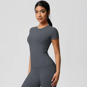Close-up of seamless dark grey yoga set with breathable fabric and athletic fit