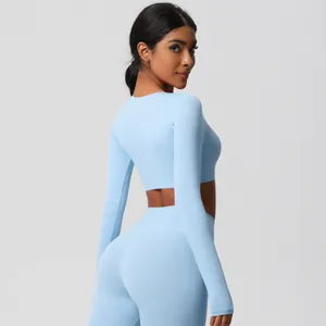 Detailed back view of light blue moisture-wicking yoga set with high-waist leggings