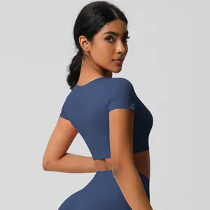 Close-up side view of high-elasticity navy yoga set showing sleek fabric texture
