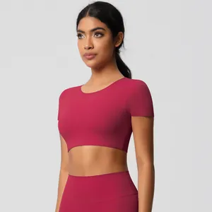 Detail of rose red tight yoga crop top and high waist leggings for workout women