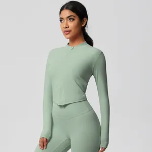 Detail of mint green yoga set with slim fit zipper jacket and high waist leggings
