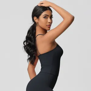 Rear view of black yoga set showing ergonomic racerback top and high waist leggings