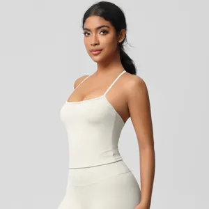 Close-up of slim straps and cream-white brushed fabric on high-elastic yoga set
