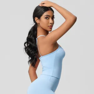 Detail of light blue yoga set featuring high-elastic quick-dry fabric and thin straps