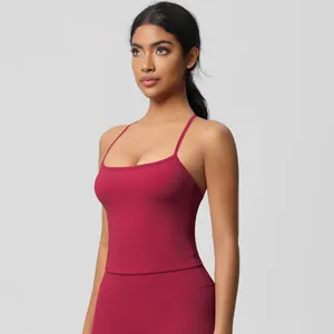 Detailed view of high-elasticity rose red yoga set with racerback tank and high waist leggings