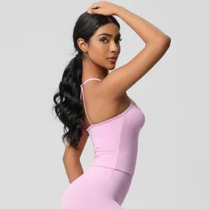 Detail of pink yoga set showing fabric texture and ergonomic side seam stitching