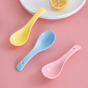 Three-piece set of Nordic matte ceramic spoons in yellow, blue, and pink colors