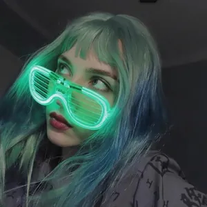 Detail showing green LED shutter glasses glowing in the dark for party music festivals