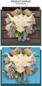 Detail of Highland Cow wreath with faux yellow flowers and patterned decorative ribbons
