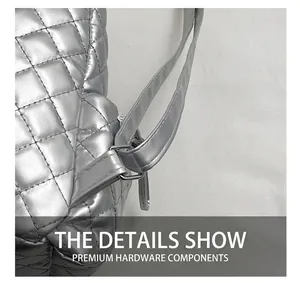 Detailed macro view of metallic silver quilted bag showing D-ring hardware and stitching