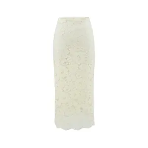 Detailed view of elegant off-white lace skirt with intricate floral crochet patterns