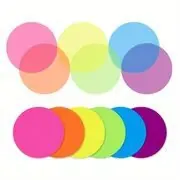 Macro detail of six colorful translucent round index stickers for aesthetic bookmarking