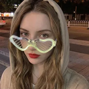 LED heart shutter glasses worn by model for night party and music festival lighting