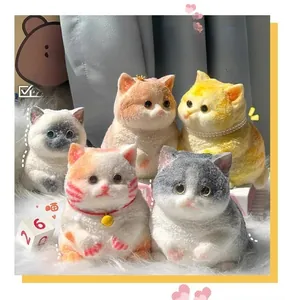 Detailed group shot of five colorful squishy cat stress relief toys on a plush white rug