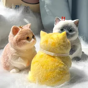 Detailed view of three realistic cat figurines with flocking texture on a soft white rug
