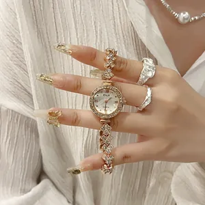 Elegant gold mermaid bracelet watch for women with sparkling rhinestones and white dial