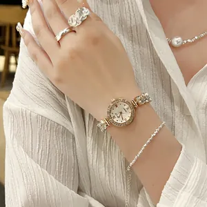 Elegant rose gold mermaid watch for women with sparkling diamonds and metal chain strap
