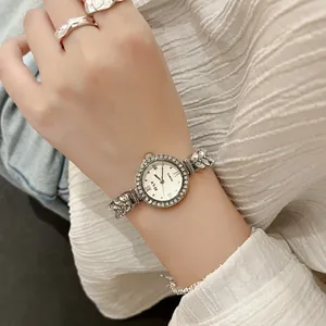 Silver mermaid quartz watch for women featuring rhinestone band and crystal accents