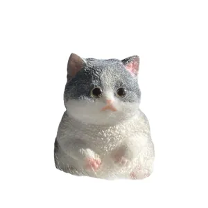 Cute grey and white squishy cat stress relief toy for desk decor and office relaxation
