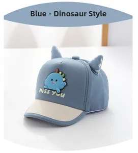 Detail of baby dinosaur sun hat with 3D fins and adjustable snapback in blue