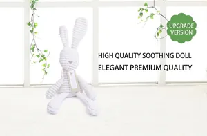 Detail view of a white long-legged bunny plush toy with soft corduroy striped texture