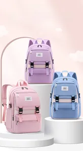 Three colorful lightweight school backpacks for kids in purple, pink, and sky blue hues