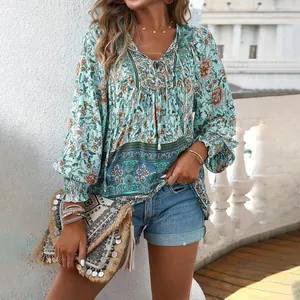 Bohemian floral print long sleeve blouse with V-neck lace-up and ethnic pattern hem