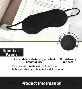 Detail of breathable black needle-punched fabric sleep mask on a book for travel