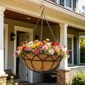 Hanging garden basket with coconut coir liner and colorful flowers on a porch