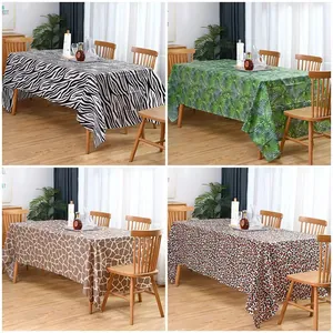 Detail view of animal patterns on waterproof PEVA tablecloth for outdoor parties