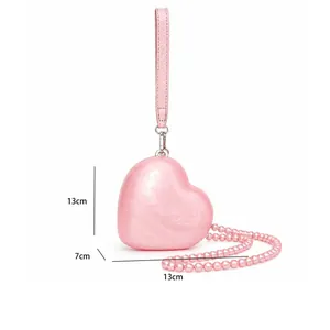 Detailed size chart of pink heart-shaped acrylic bag with dimensions 13x13x7 cm