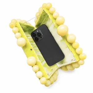 Detailed interior of marble acrylic clutch bag showing capacity for a large smartphone