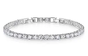 Macro detail of stainless steel tennis bracelet featuring square set cubic zirconia stones