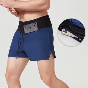 Men's navy running shorts with high elastic waistband and integrated phone pocket