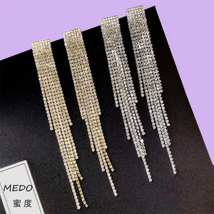 Elegant long tassel rhinestone drop earrings in gold and silver finish for formal events