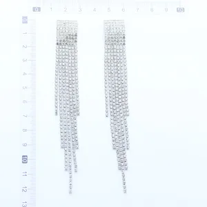 Detail shot of long silver tassel earrings with crystal fringe measuring 12.5cm