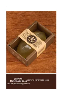 Macro detail of translucent green jasmine handmade soap in elegant gift box packaging