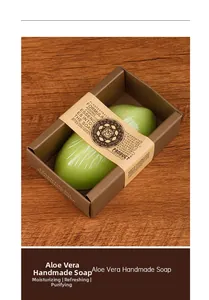 Close-up of aloe vera handmade soap in kraft packaging on a textured wooden background