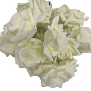 Solar LED rose flower string lights in creamy white for outdoor garden party decoration