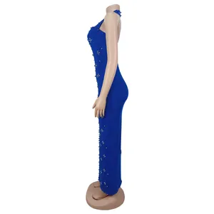 Close-up of royal blue bodycon dress featuring halter neck and silver rhinestone embellishments