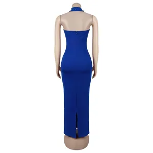 Detail of royal blue halter neck dress featuring decorative beadwork and a slim fit cut