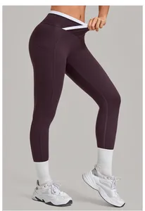Détail de legging de yoga taille haute avec poche latérale et taille contrastée en V